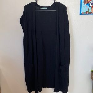 Long, black knit vest with POCKETS!